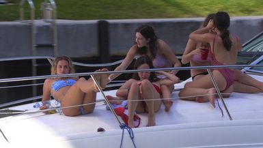Bow Bliss: Feet Up, Hair Loose - Crew Relaxes in Ultimate Miami Yacht Comfort! 🚤🌅👣